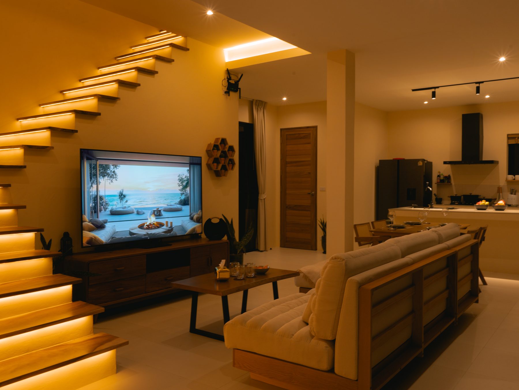 Open-plan living with 75 inch TV